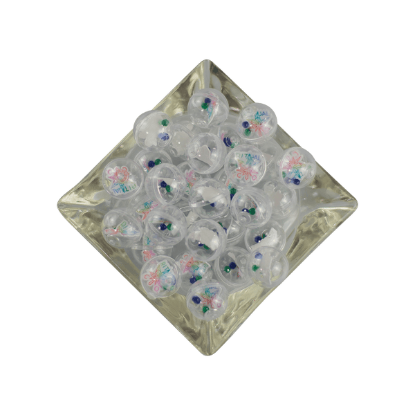 This is a collection of Gemball Machine prizes featuring a Ritual Co. sticker and 3mm green, blue and clear terp pearls. Available at Ritual Colorado you can buy a spin for just $2.