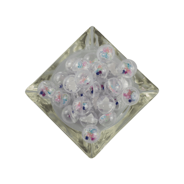 This is a collection of Gemball Machine prizes featuring a Ritual Co. sticker and 3mm ruby, clear and blue terp pearls. Available at Ritual Colorado you can buy a spin for just $2.