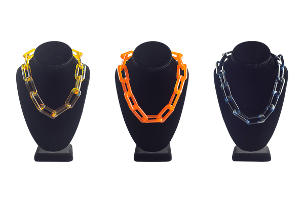 These are Glass Choker Chains by Technicolor Tony available at Ritual Colorado. Handmade in Denver, Colorado this unique glass chain features subtle details for a statement jewelry piece.