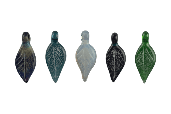 These are Glass Leaf Pendants by Biting Glass available at Ritual Colorado. Featuring vibrant glass colors, carved texture and a built-in bail for a sleek piece of jewelry made locally in Denver, Colorado.