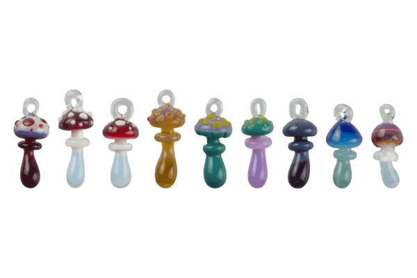 These are Loop Mushroom Pendants by Technicolor Tony available at Ritual Colorado. Featuring vibrant glass colors these handmade jewelry pieces are crafted in Denver, CO.