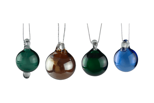 These are Holiday Globe Ornaments by Biting Glass available at Ritual Colorado. Classic sphere ornaments in vibrant colors and featuring a built-in glass bail for longevity.