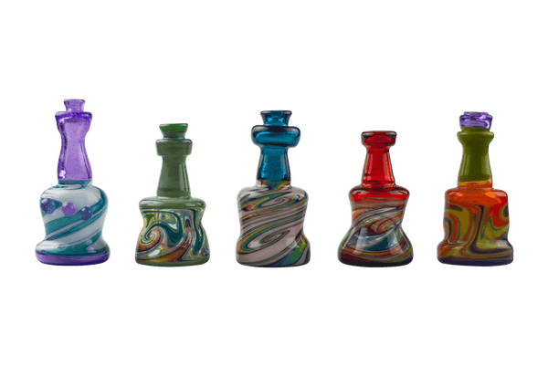 This is the Wig Wag Puffco Peak Dry Top from Technicolor Tonys available at Ritual Colorado. Featuring a multi-color swirling base accented by a bright colored mouthpiece.