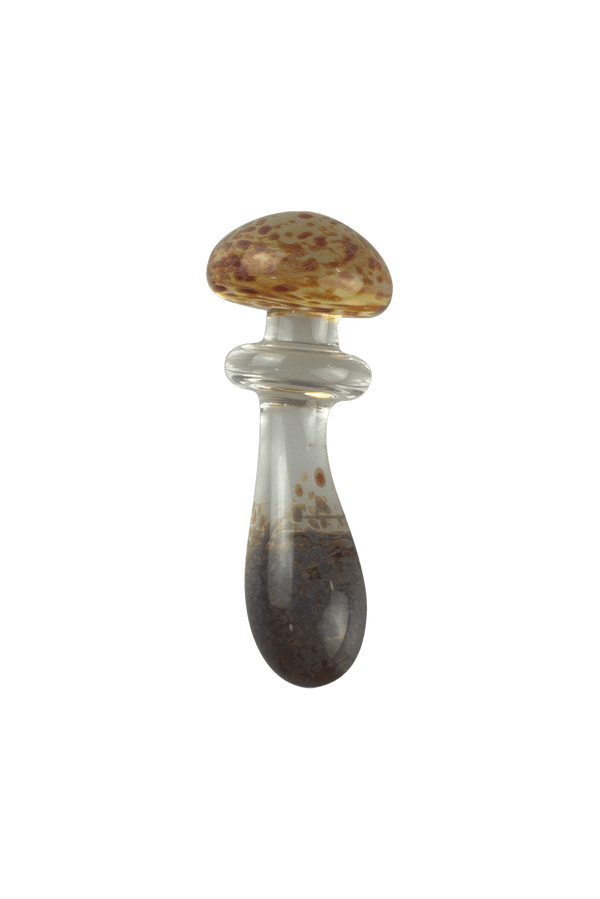 This is the Clear & Frit Mushroom Trinket by Technicolor Tony available at Ritual Colorado. A fun glass trinket featuring an accented stem and cap with amber purple frit.