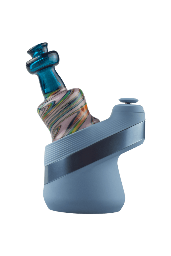This is the Blue Stardust Wig Wag Puffco Peak Dry Top from Technicolor Tonys available at Ritual Colorado. Featuring a multi-color swirling base accented by a bright colored mouthpiece.