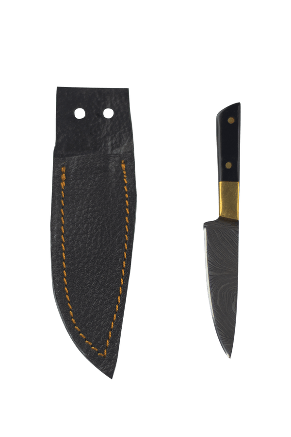 This is the Black / Gold Chef's Knife Dab Tool from Dabmascus available at Ritual Colorado. It features a two-pin handle and high-quality Damascus Steel blade for a truly unique and special dab tool.