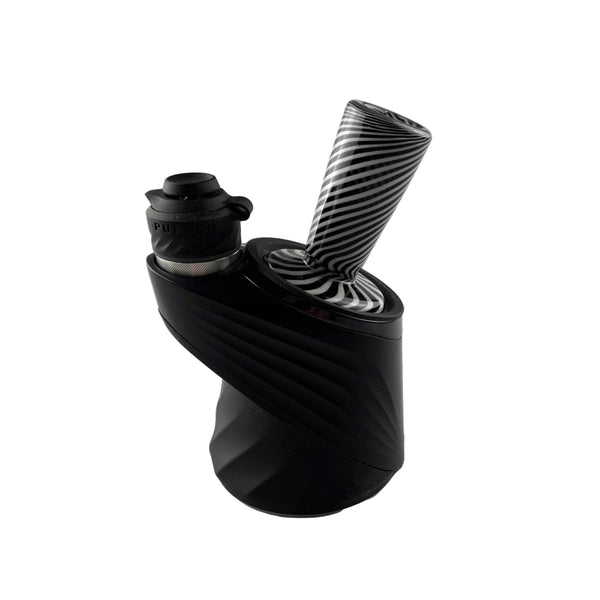 This is the Black & White Puffco Peak Dry Top by Technicolor Tony available at Ritual Colorado. A sleek upgrade to your Peak glass piece offering a discrete low profile and high volume airflow through the wide mouthpiece.