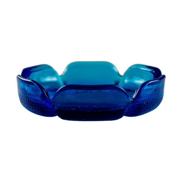 This is the Blenko Blue Lotus Glass Ashtray from Heady Vintage available at Ritual Colorado. The beautiful vintage ashtray features slits around the "petals" for convenient storage of your smoking and vaporizing tools.