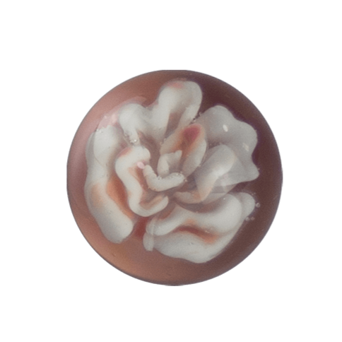 This is an Implosion Flower Marble by Biting Glass available at Ritual Colorado. A handmade borosilicate glass marble featuring vibrant striking purple rainbow glass.