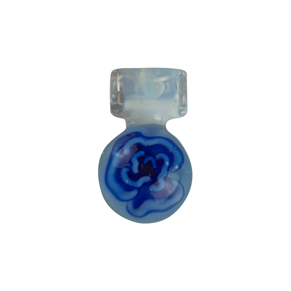 This is the Wintry Blue Flower Medallion Pendant by Biting Glass available at Ritual Colorado. A beautiful handmade borosilicate jewelry piece with tons of different color expressions depening on the lighting.