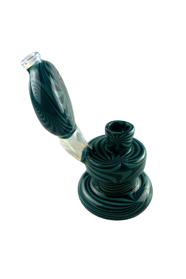 This is the Blueberry Wig Wag Bubbler by Technicolor Tony available at Ritual Colorado. A heady 14mm water piece featuring tons of detailed color work and intricate wig wag patterns.