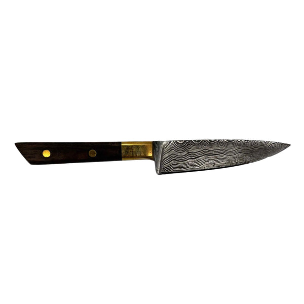 This is the Brown Wood Chef's Knife Dab Tool from Dabmascus available at Ritual Colorado. It features a two-pin handle and high-quality Damascus Steel blade for a truly unique and special dab tool made here in the U.S.