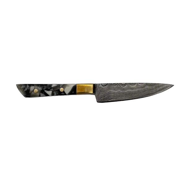 This is the Greyscale Chef's Knife Dab Tool from Dabmascus available at Ritual Colorado. It features a two-pin handle and high-quality Damascus Steel blade for a truly unique and special dab tool made here in the U.S.