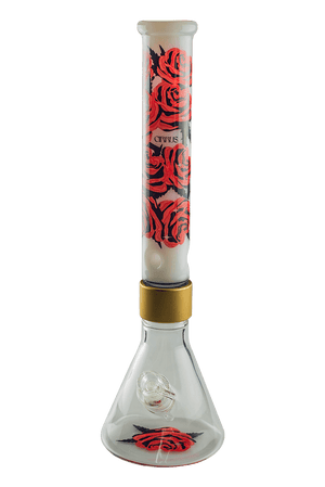 This is the Cirrus Bouquet Bong from Cirrus Seshware available at Ritual Colorado. The tall beaker-style bong features unscrewable upper and lower pieces held together by a beautiful gold collar. The rose details on the neck and base add style to this one-of-a-kind limited edition bong. 