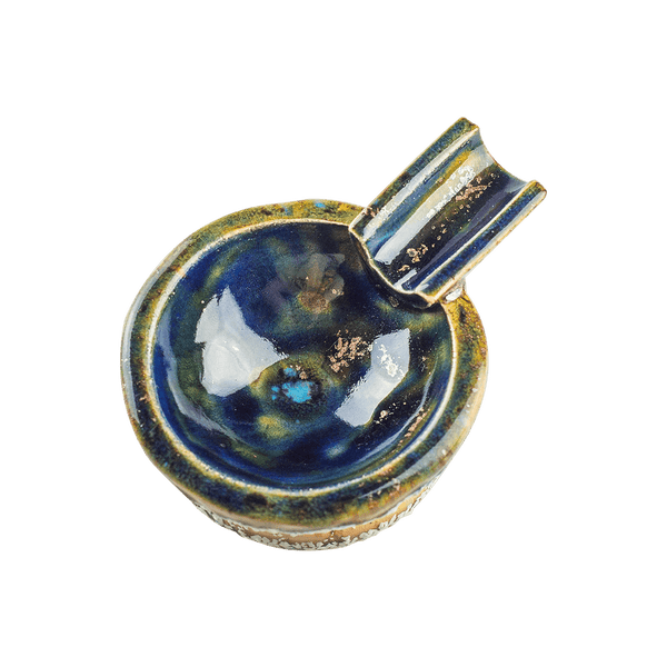 This is the Copacabana ceramic ash tray from Jaxel's Art available at Ritual Colorado. It features an extended arm perfect for holding your joint, dynavap or whip mouthpiece. Check out all the beautiful one-of-one ceramic products from Jaxel's Art and let us know if you're ever interested in a custom creation.