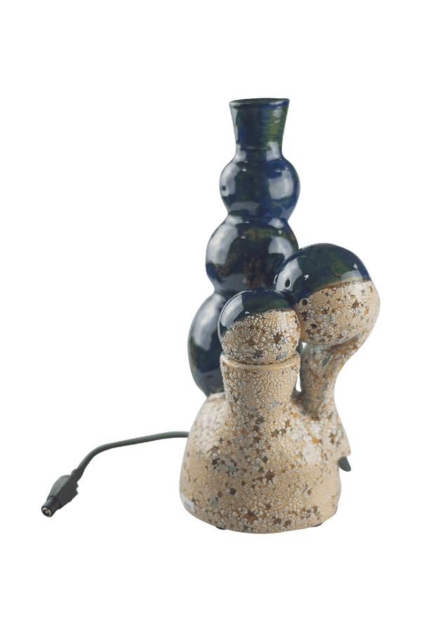This is the VapBong Wonderlamp Copacabana by Jaxel's Art available at Ritual Colorado. An all-in-one dry herb vaporizer handcrafted from ceramic artists.