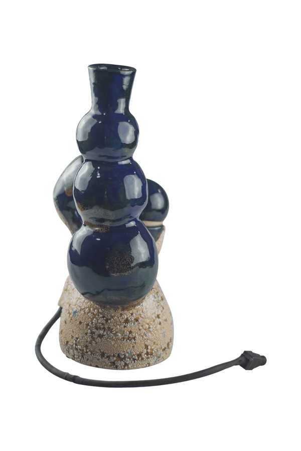 This is the VapBong Wonderlamp Copacabana by Jaxel's Art available at Ritual Colorado. An all-in-one dry herb vaporizer handcrafted from ceramic artists.