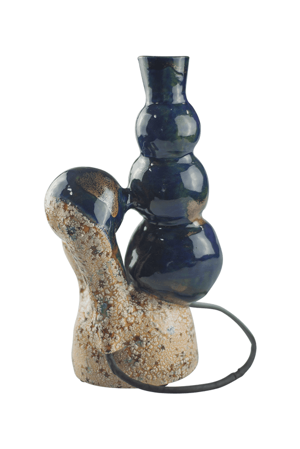 This is the VapBong Wonderlamp Copacabana by Jaxel's Art available at Ritual Colorado. An all-in-one dry herb vaporizer handcrafted from ceramic artists.