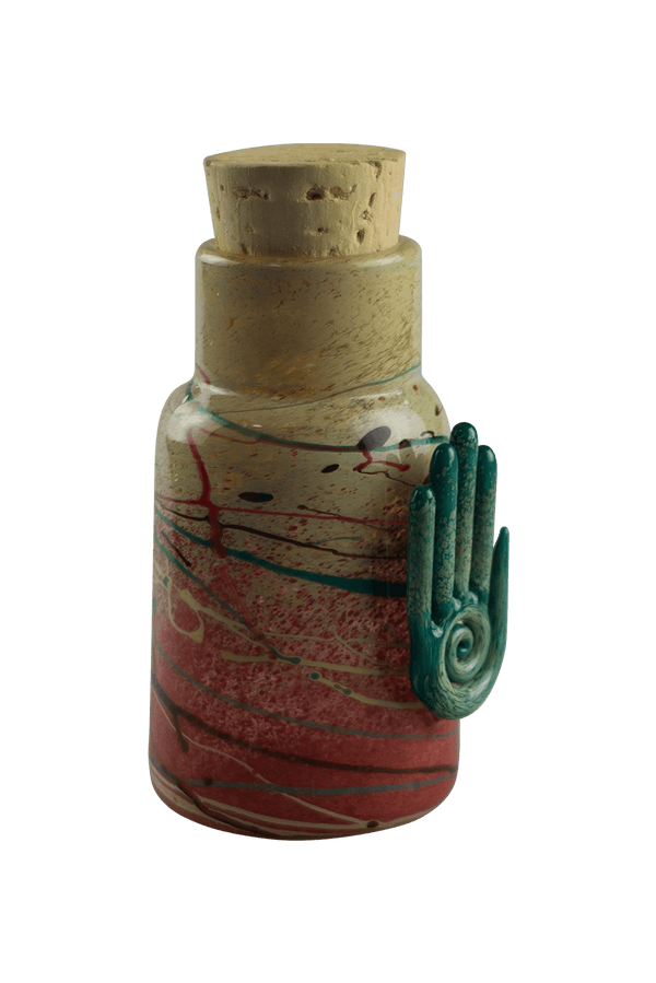 This is the Eternal Life Glass Jar by Maze Glass available at Ritual Colorado. Featuring a cork stopper and Eternal Life pendant this is a one-of-a-kind glass jar.