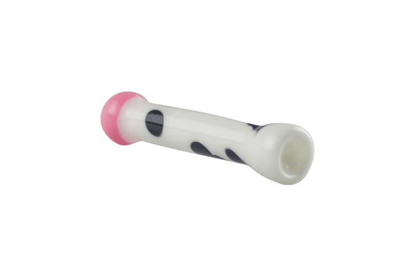 This is the Cow Print Chillum by Biting Glass available at Ritual Colorado. A sleek one hitter featuring a fun black and white cow print and a pink "udder" mouthpiece.