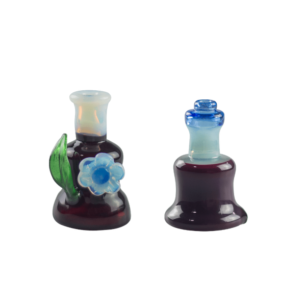 These are Dark Phoenix Peak Dry Tops by Technicolor Tony available at Ritual Colorado. Featuring colorful accent mouthpieces and details these are a sweet upgrade for your Puffco Peak or Peak Pro.