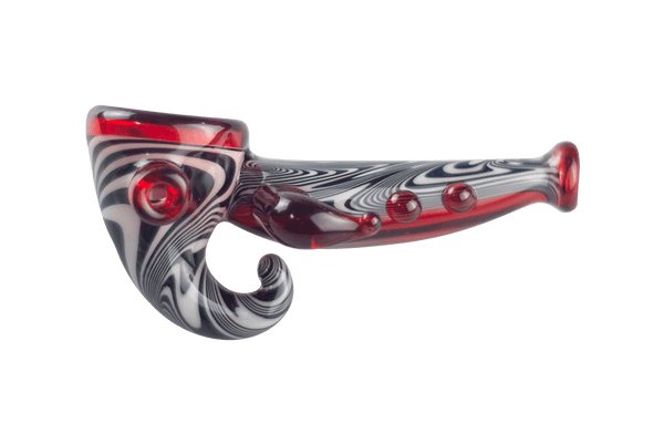 This is the Dragonfruit Hand Pipe from Technicolor Tonys available at Ritual Colorado. Featuring an intricate black and white wig wag paired with vibrant pomegranate glass.