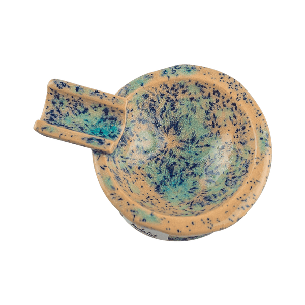 This is the Electric Sparkler ceramic ash tray from Jaxel's Art available at Ritual Colorado. It features an extended arm perfect for holding your joint, dynavap or whip mouthpiece. Check out all the beautiful one-of-one ceramic products from Jaxel's Art and let us know if you're ever interested in a custom creation.