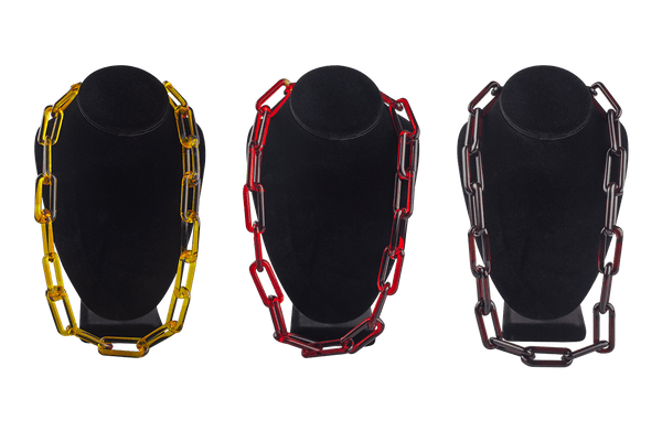 This is a set of Yellow, Orange and Red Glass Chain Necklaces by Technicolor Tony available at Ritual Colorado. Featuring handmade glass links these beautiful chains work great as bracelets as well.