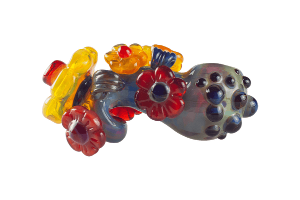 This is the Amber Purple Garden Pipe from Technicolor Tonys available at Ritual Colorado. A beautiful heady hand pipe that features amber purple glass in the base with tons of fun accent colors.