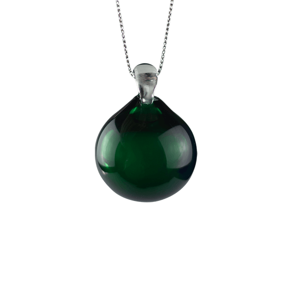 This is the Forest Holiday Globe Ornament by Biting Glass available at Ritual Colorado. Classic sphere ornaments in vibrant colors and featuring a built-in glass bail for longevity.