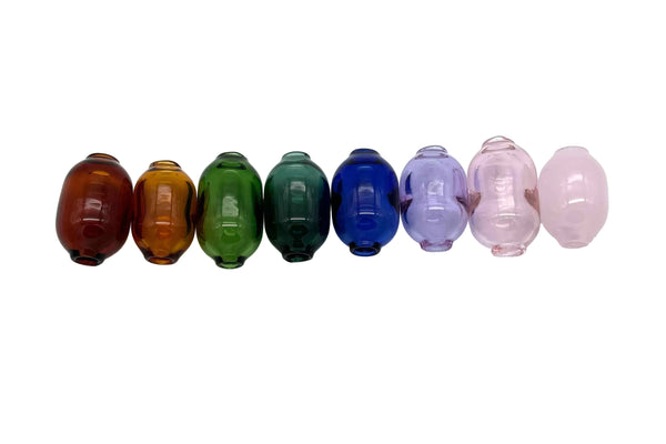 These are Handmade Glass Macrame Beads (5mm ID) by Biting Glass available at Ritual Colorado. Available in a range of fun colors these hand crafted beads are the perfect compliment for your crafting project.