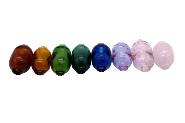 These are Handmade Glass Macrame Beads (5mm ID) by Biting Glass available at Ritual Colorado. Available in a range of fun colors these hand crafted beads are the perfect compliment for your crafting project.