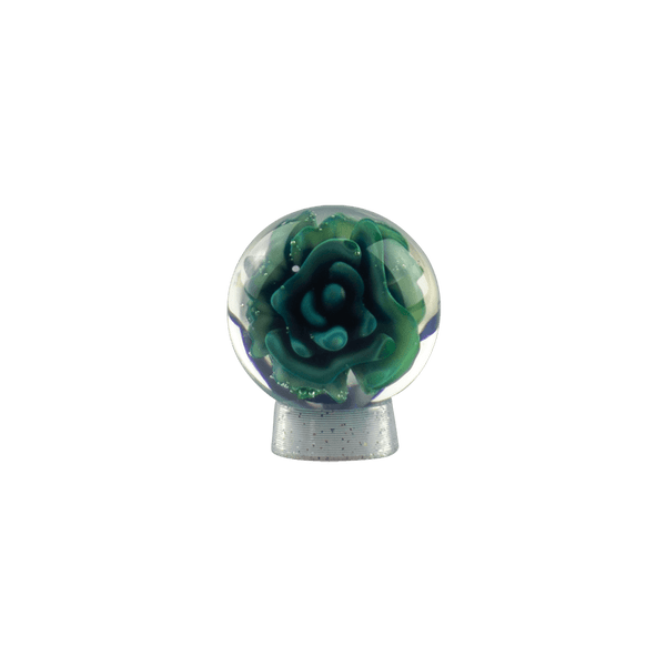 This is the Blue / Green Flower Marble by Biting Glass available at Ritual Colorado. A beautiful handmade glass marble featuring many shades of blue and green.