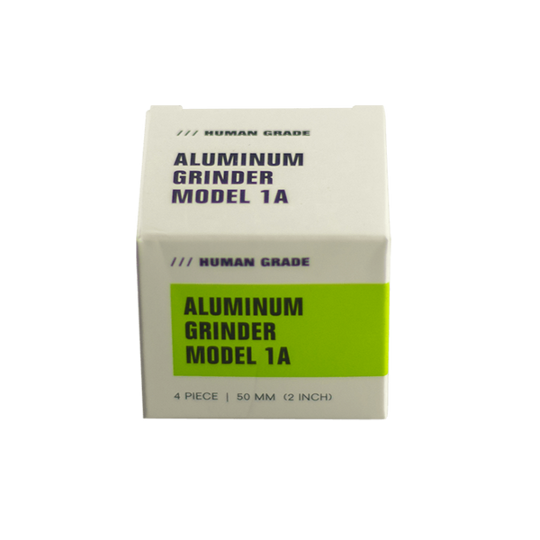 This is a 4-Piece, 2" Aluminum Grinder by Human Grade available at Ritual Colorado. Featuring a sleek finish and included scraper tool this is a great starter grinder and awesome value!