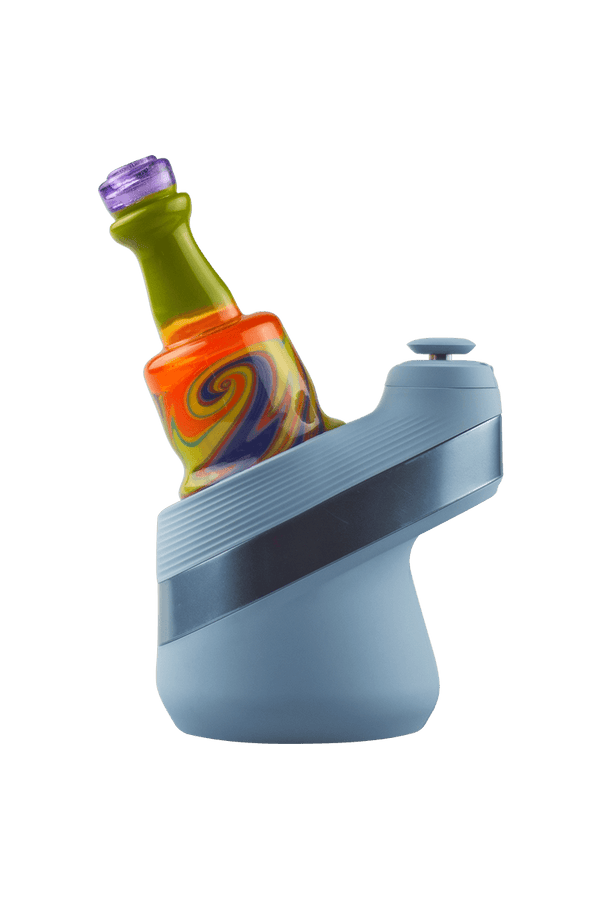 This is the Groovy Wig Wag Puffco Peak Dry Top from Technicolor Tonys available at Ritual Colorado. Featuring a multi-color swirling base accented by a bright colored mouthpiece.