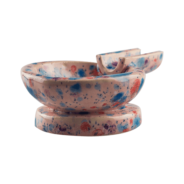 This is the Gumball ceramic ash tray from Jaxel's Art available at Ritual Colorado. It features an extended arm perfect for holding your joint, dynavap or whip mouthpiece. Check out all the beautiful one-of-one ceramic products from Jaxel's Art and let us know if you're ever interested in a custom creation.