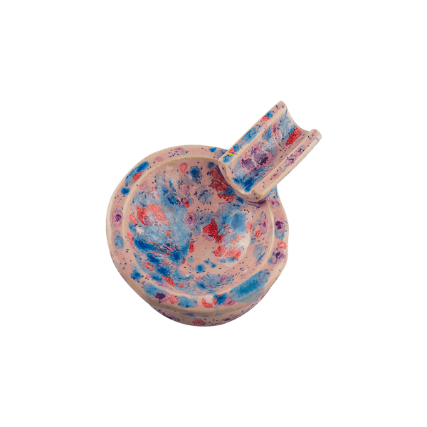 This is the Gumball ceramic ash tray from Jaxel's Art available at Ritual Colorado. It features an extended arm perfect for holding your joint, dynavap or whip mouthpiece. Check out all the beautiful one-of-one ceramic products from Jaxel's Art and let us know if you're ever interested in a custom creation.