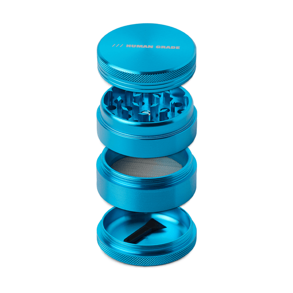 This is a Blue 4-Piece, 2" Aluminum Grinder by Human Grade available at Ritual Colorado. Featuring a sleek finish and included scraper tool this is a great starter grinder and awesome value!