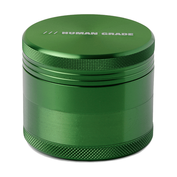 This is a Green 4-Piece, 2" Aluminum Grinder by Human Grade available at Ritual Colorado. Featuring a sleek finish and included scraper tool this is a great starter grinder and awesome value!