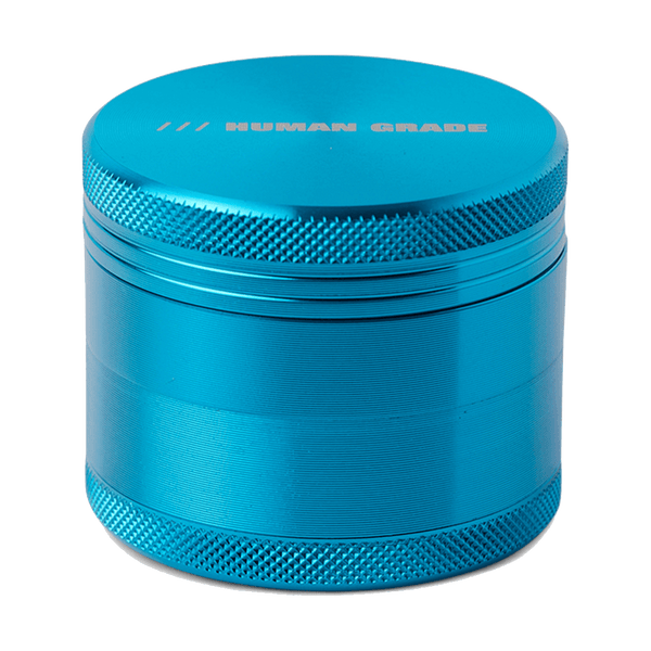 This is a Light Blue 4-Piece, 2" Aluminum Grinder by Human Grade available at Ritual Colorado. Featuring a sleek finish and included scraper tool this is a great starter grinder and awesome value!