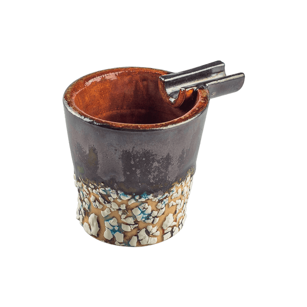 This is the Hot Cocoa ceramic ash tray from Jaxel's Art available at Ritual Colorado. It features an extended arm perfect for holding your joint, dynavap or whip mouthpiece. Check out all the beautiful one-of-one ceramic products from Jaxel's Art and let us know if you're ever interested in a custom creation.