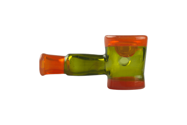 This is the Orange & Green Pipe by Technicolor Tony available at Ritual Colorado. A sleek handblown glass pipe featuring vibrant transparent green and orange glass.