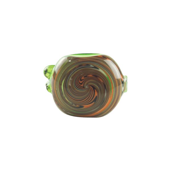 This is the Hypno Swirl Pipe by Technicolor Tony available at Ritual Colorado. A sleek handmade pipe with green accents and a halloween wig wag swirl cap on the bowl.