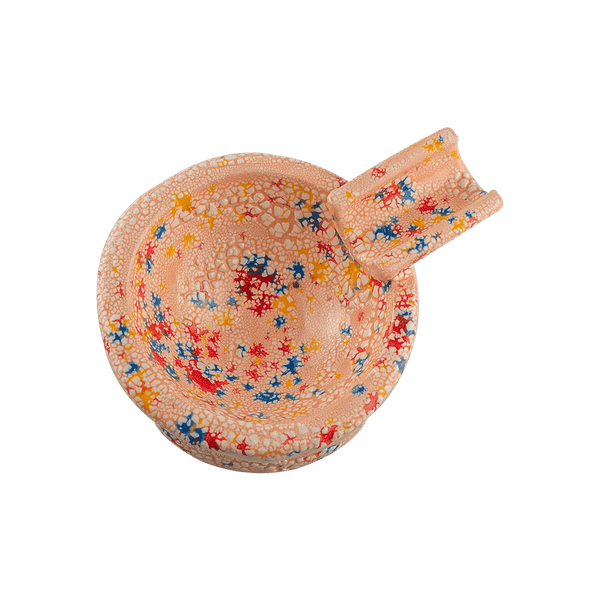 This is the Jawbreaker ceramic ash tray from Jaxel's Art available at Ritual Colorado. It features an extended arm perfect for holding your joint, dynavap or whip mouthpiece. Check out all the beautiful one-of-one ceramic products from Jaxel's Art and let us know if you're ever interested in a custom creation.