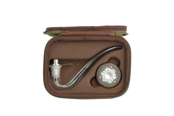 This is the Walnut Lotus Vaporizer Kit by INHALE available at Ritual Colorado. A portable torch-powered dry herb vape with included glass dry pipe and 14mm bowl that you can use with all your favorite glass bongs.