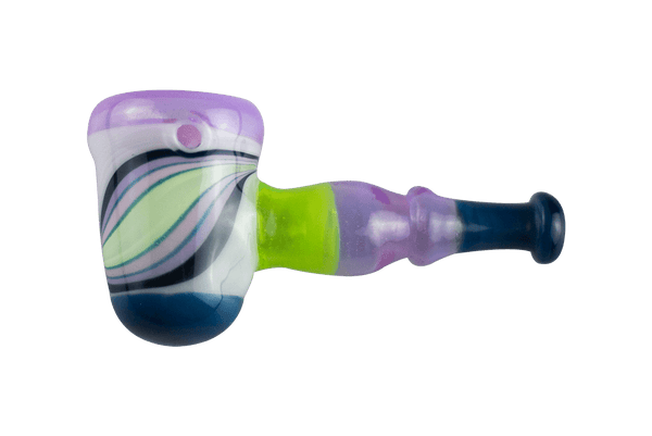 This is the Purple Swirl Hammer Pipe by Technicolor Tonys available at Ritual Colorado. The beautiful heady hand pipe features a carb on the left side of the bowl and vibrant green and purple glass colors.