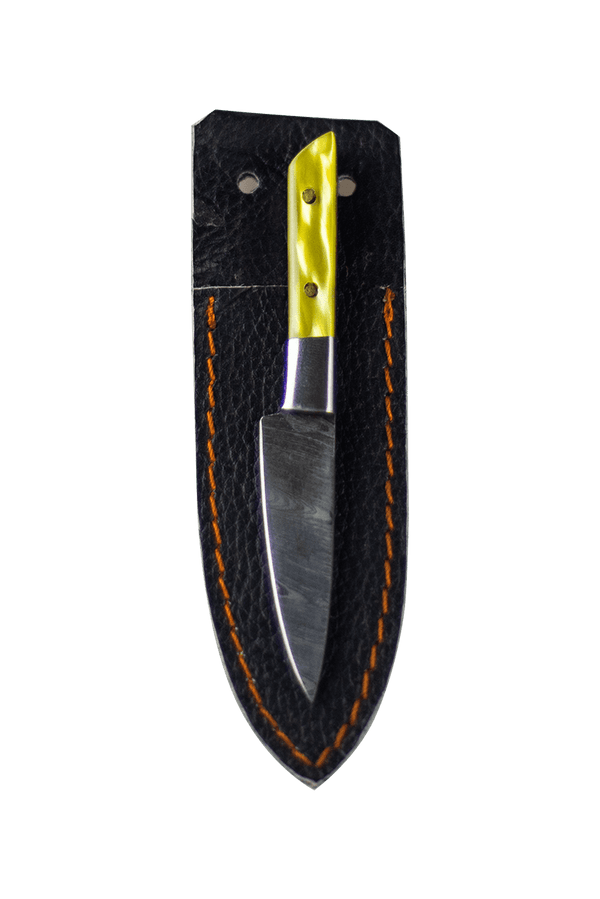 This is the Chef's Knife Dab Tool from Dabmascus available at Ritual Colorado. It features a two-pin handle and high-quality Damascus Steel blade for a truly unique and special dab tool.