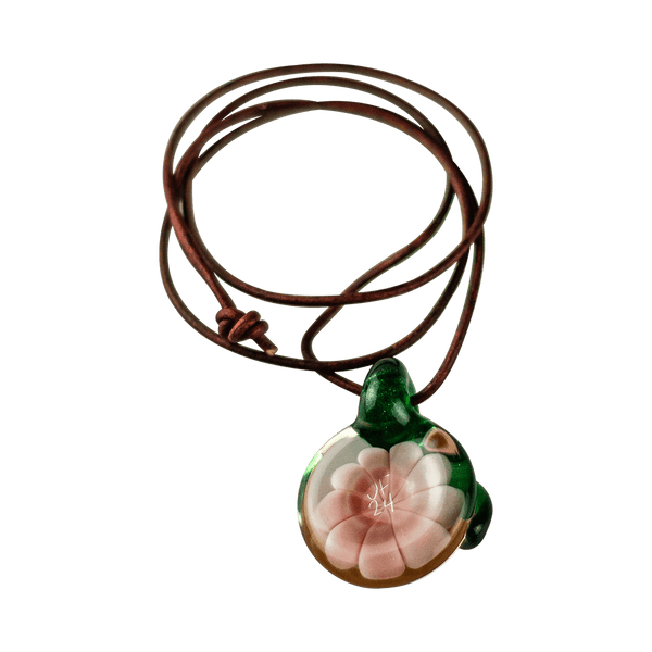 This is the Orange Burst Dot Stack Glass Pendant from Faltermeier Glass available at Ritual Colorado. A beautiful hand blown glass accessory that features intricate dot work and an included leather cord.