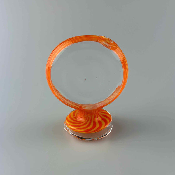 These are Disc Puffco Peak Dry Tops by Technicolor Tony available at Ritual Colorado. Featuring sleek clear discs with vibrant color outlines for a one-of-a-kind upgrade to your eRig.