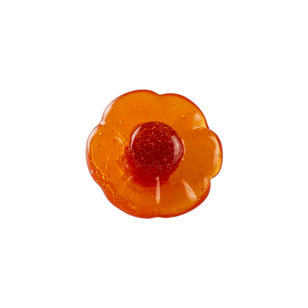 These are glass flower pins from Technicolor Tonys available at Ritual Colorado. The beautiful floral shapes feature a pin and closure on the back so you can easily pop them on your hat or other favorite place to display glass art.